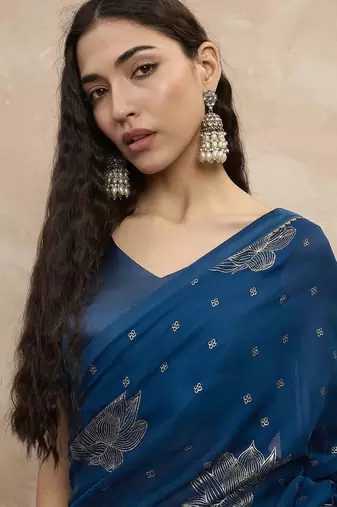Teal floral satin designer saree