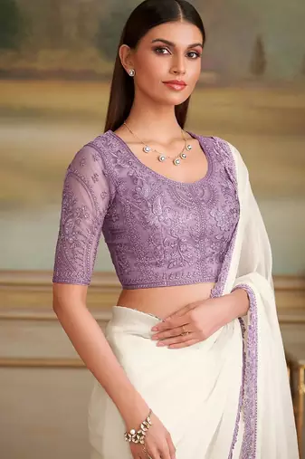 Off white embellished embroidered  georgette saree
