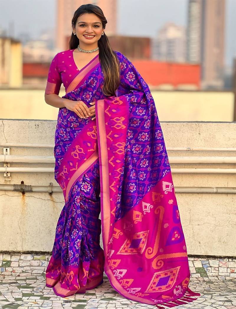 Purple purple pink woven design zari patola saree