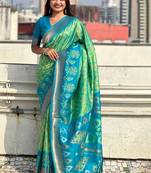 Green ethnic motifs woven design zari kanjeevaram saree