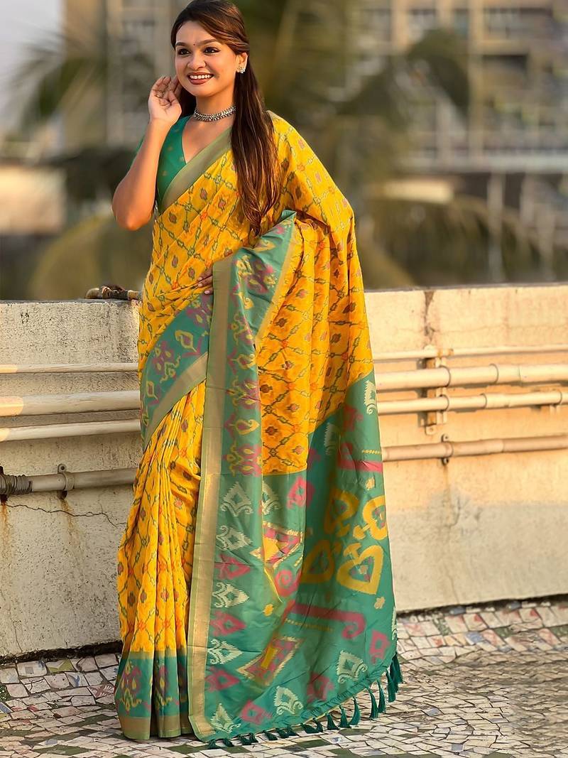 Yellow woven design zari patola saree