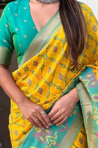 Yellow woven design zari patola saree