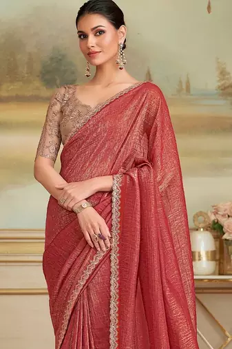 Rust embellished zari  georgette heavy work saree