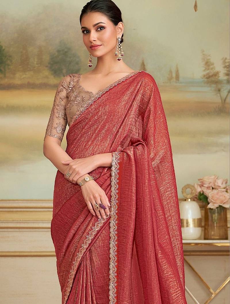 Rust embellished zari  georgette heavy work saree