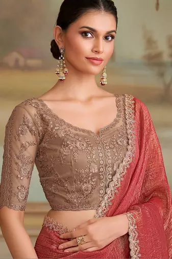 Rust embellished zari  georgette heavy work saree
