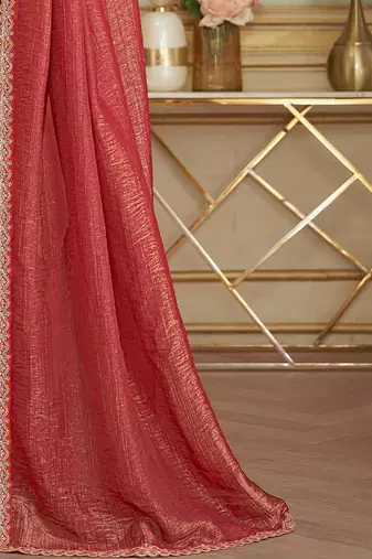 Rust embellished zari  georgette heavy work saree