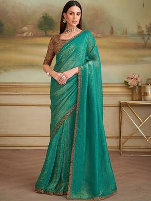 Teal woven design embroidered  georgette designer saree 1