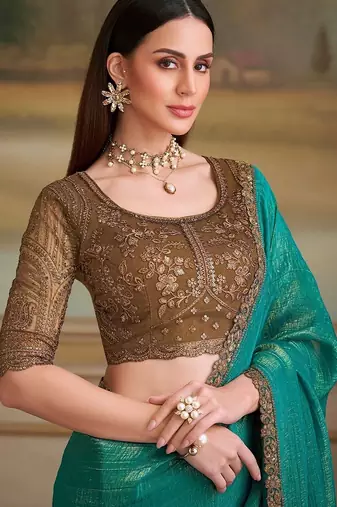 Teal woven design embroidered  georgette designer saree