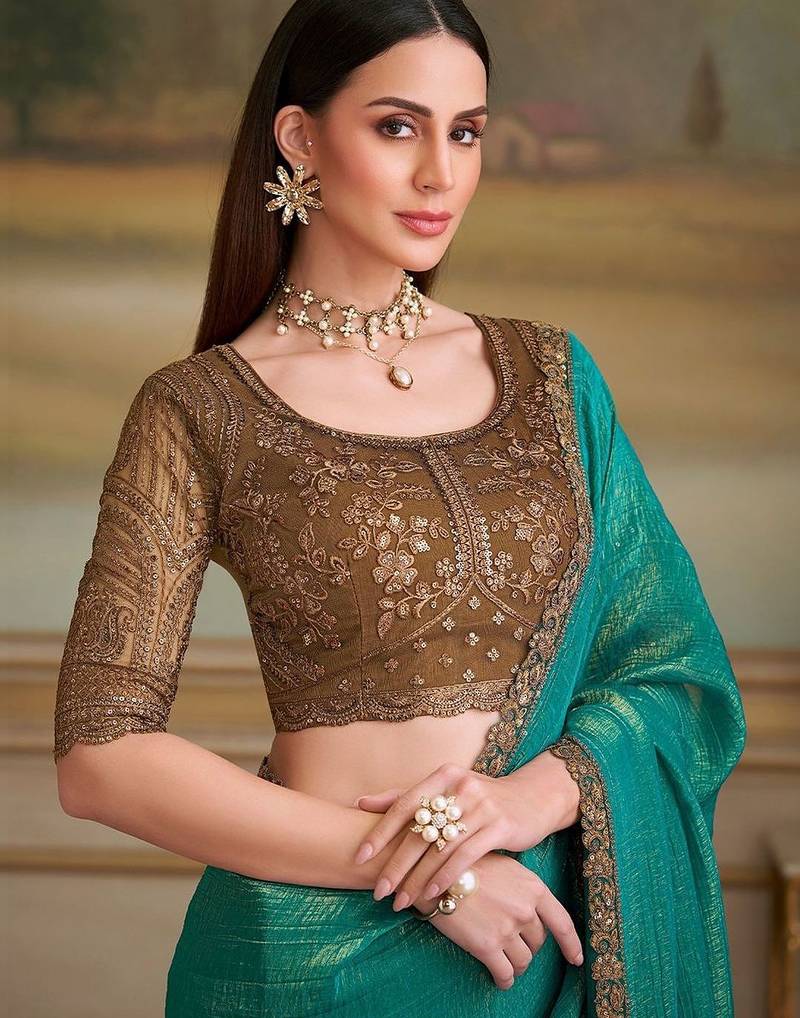 Teal woven design embroidered  georgette designer saree