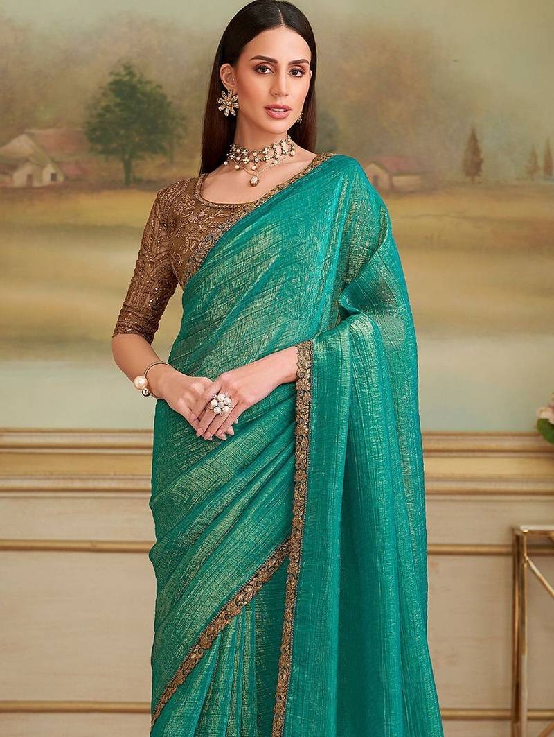 Teal woven design embroidered  georgette designer saree