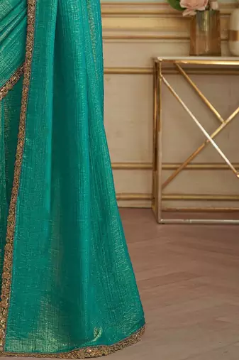 Teal woven design embroidered  georgette designer saree