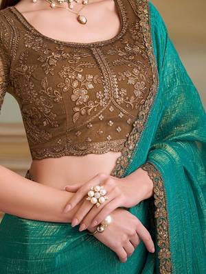 Teal woven design embroidered  georgette designer saree 5