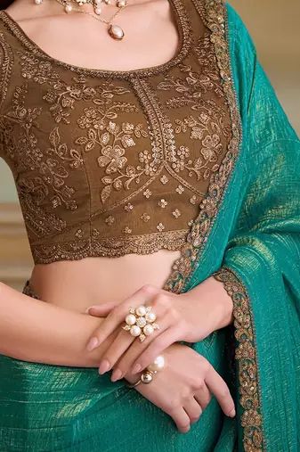 Teal woven design embroidered  georgette designer saree