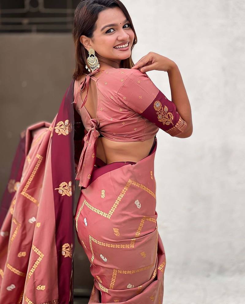 Coral woven design zari silk blend banarasi saree