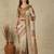 Beige ethnic motifs woven design silk cotton kasavu saree