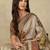 Beige ethnic motifs woven design silk cotton kasavu saree