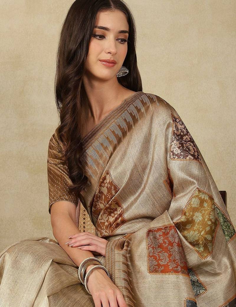 Beige ethnic motifs woven design silk cotton kasavu saree