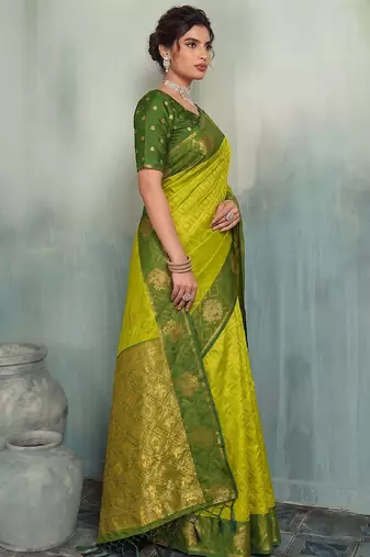 light green brasso saree dark green blouse festive ethnic fashion saree