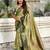 Green ethnic motifs woven design zari banarasi saree with tasseled
