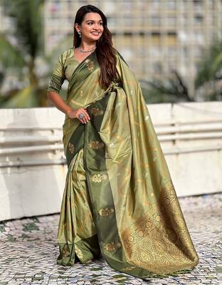 Green ethnic motifs woven design zari banarasi saree with tasseled 2