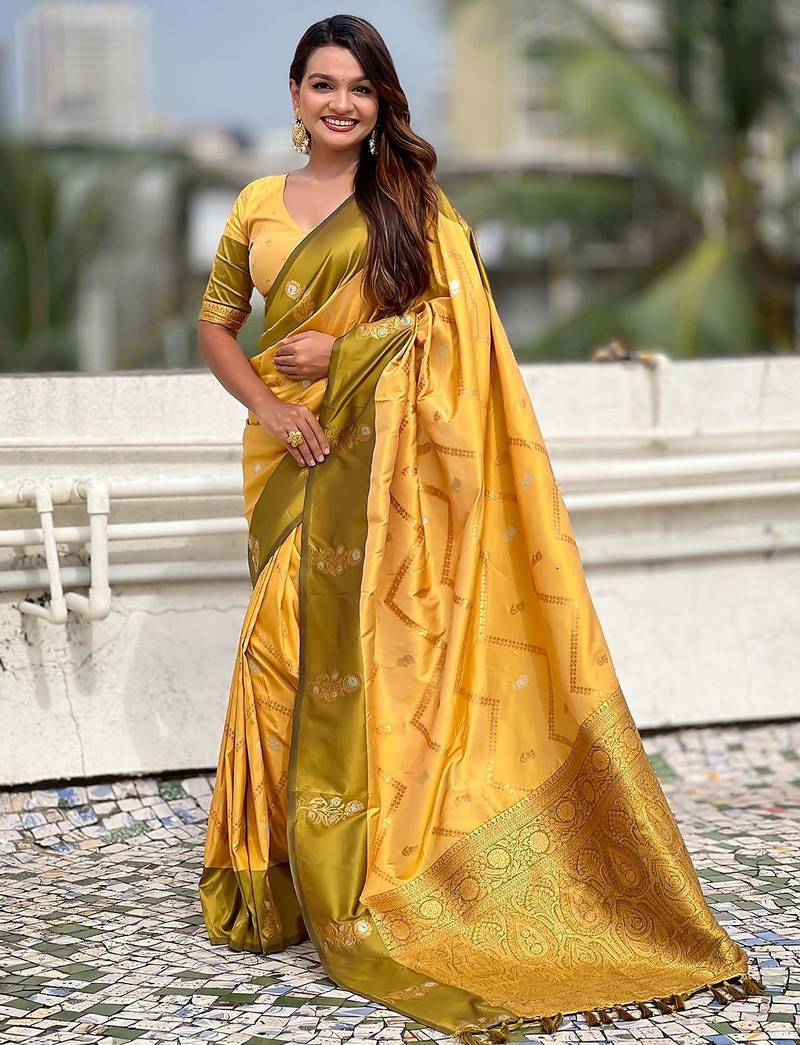 Yellow woven design zari silk blend banarasi saree