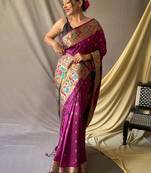 Purple ethnic motifs woven design zari paithani saree