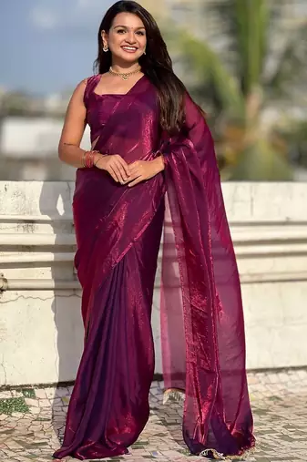 Purple shimmer satin tissue saree with golden tassels