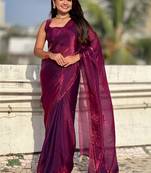 Purple shimmer satin tissue saree with golden tassels