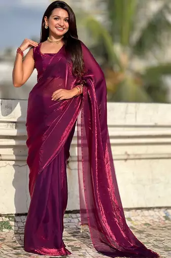 Purple shimmer satin tissue saree with golden tassels