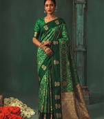 women's green soft pochampally saree with rich zari border for wedding, festive & party wear