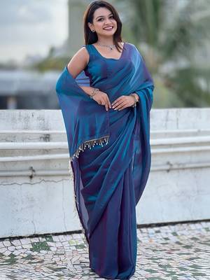 Blue blue shimmer satin tissue saree with golden tassels 2