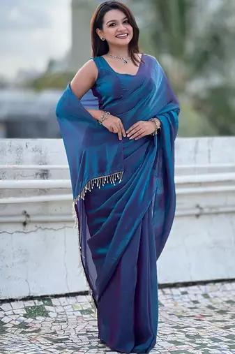 Blue blue shimmer satin tissue saree with golden tassels