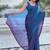 Blue blue shimmer satin tissue saree with golden tassels