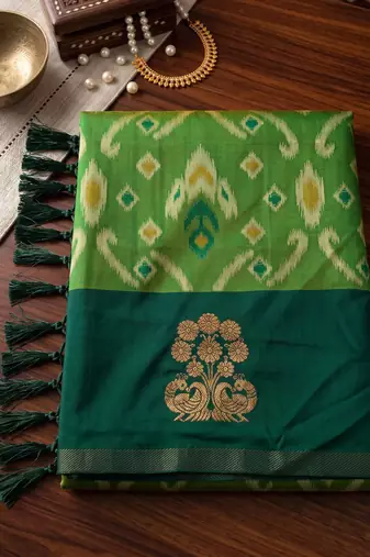 women's green soft pochampally saree with rich zari border for wedding, festive & party wear