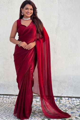 Maroon red shimmer satin tissue saree with golden tassels