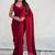 Maroon red shimmer satin tissue saree with golden tassels
