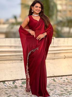 Maroon red shimmer satin tissue saree with golden tassels 2