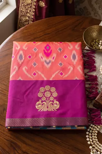 women's peach soft pochampally saree with rani pink border for festive & traditional wedding wear