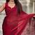 Maroon red shimmer satin tissue saree with golden tassels