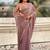 Mauve onion shimmer satin tissue saree with golden tassels