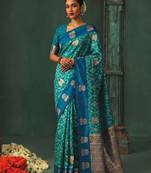 women's sky blue soft pochampally saree with royal blue border for festive & wedding party wear