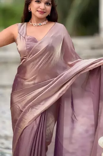 Mauve onion shimmer satin tissue saree with golden tassels