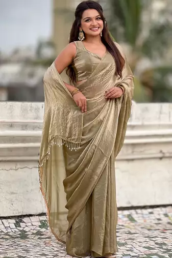 Olive golden beige shimmer satin tissue saree with golden tassels