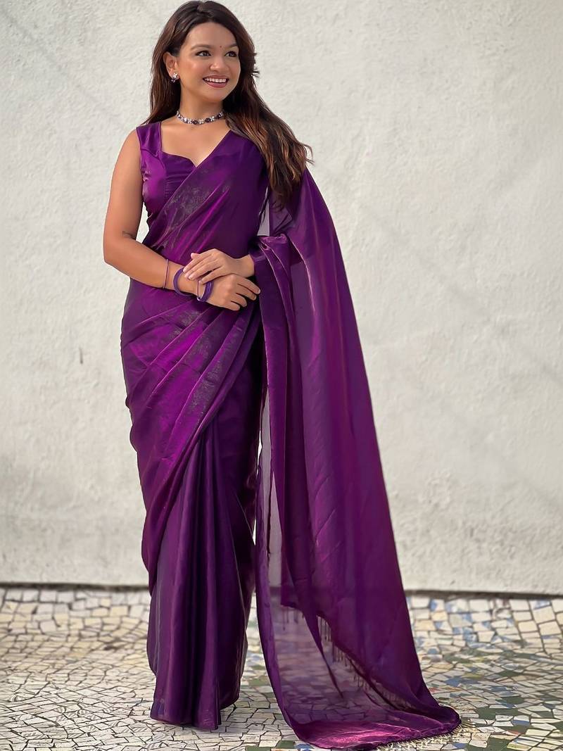 Purple purple shimmer satin tissue saree with golden tassels