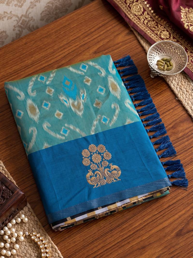 women's sky blue soft pochampally saree with royal blue border for festive & wedding party wear