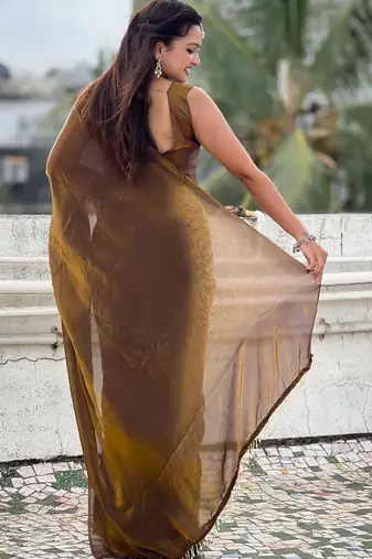 Brown mahendi green shimmer satin tissue saree with golden tassels
