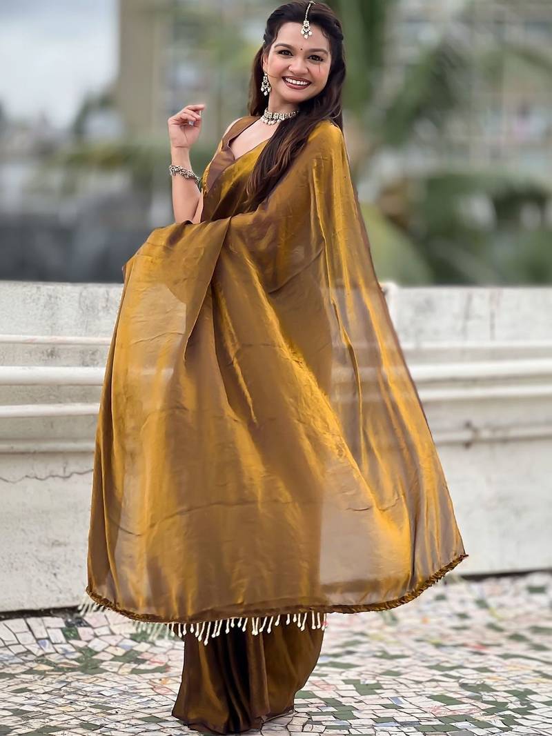 Brown mahendi green shimmer satin tissue saree with golden tassels