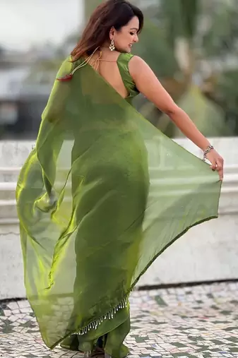 Lime green shimmer satin tissue saree with golden tassels