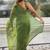 Lime green shimmer satin tissue saree with golden tassels