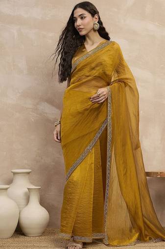 Mustard embellished beads and stones border saree